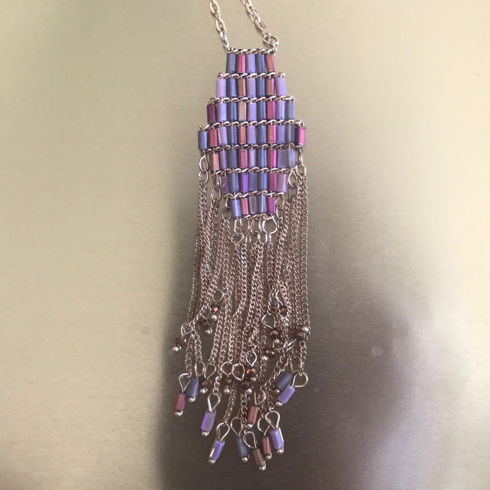 Beaded necklace with gold tassels and more beads